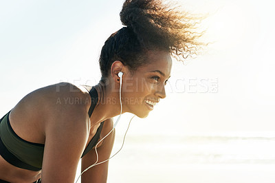Buy stock photo Start, beach and woman with exercise, smile and training with wellness, challenge and earphones. Cardio, ocean and person with fitness, workout and happiness with sound, ready and healthy routine