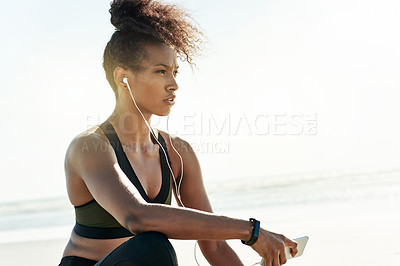 Buy stock photo Girl, smartphone and fitness at beach with earphones for audio, reflection or space with exercise by sea. Woman, phone and runner with music, break and mobile app for subscription by ocean in Ecuador
