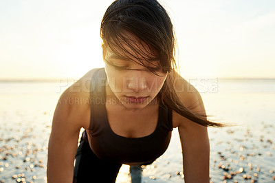 Buy stock photo Fitness, health and woman on beach with push up, wellness and commitment to outdoor workout at sunrise. Muscle, training and girl at ocean for weight loss, morning exercise and natural body care