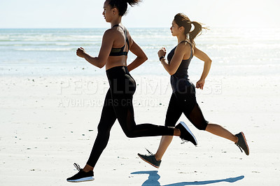 Buy stock photo Cardio exercise, women and running on beach for marathon practice, fitness challenge or endurance. Teamwork, people or jog on seashore for resistance training, physical activity or sports performance