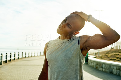 Buy stock photo Black man, stretching neck and fitness at beach to start exercise, training and getting ready. Male person, athlete runner and warm up outdoor of sports workout, prepare muscles and marathon practice