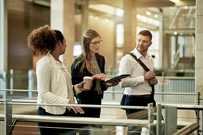 Buy stock photo Walking, tablet and meeting with business people in hotel for conference, team and digital schedule. Convention center, tradeshow seminar and online agenda with employees for symposium and expo
