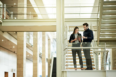 Buy stock photo Business people, tablet and discussion on stairs for planning, agenda or feedback for project. Proposal, tech and admin team in office for meeting, schedule update or support for company development