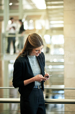 Buy stock photo Happy woman, smartphone and texting at office, scroll and excited with notification for real estate deal. Person, realtor and phone with smile for property sale, investment or contact client with app