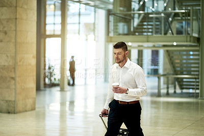 Buy stock photo Man, suitcase and walk on business trip at airport with baggage, immigration or coffee in lobby for travel. Person, luggage and thinking at terminal for international departure, flight or journey