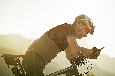 Buy stock photo Phone, online and bike with man in nature for location app, cycling route and social media post. Speed performance tracking, contact and bicycle with person outdoor for reading and direction search