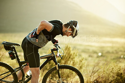 Buy stock photo Back pain, cycling and man with fitness, joint injury and inflammation with hobby. Outdoor, person and cyclist with bike, muscle tension and travel with practice, sore and workout with training