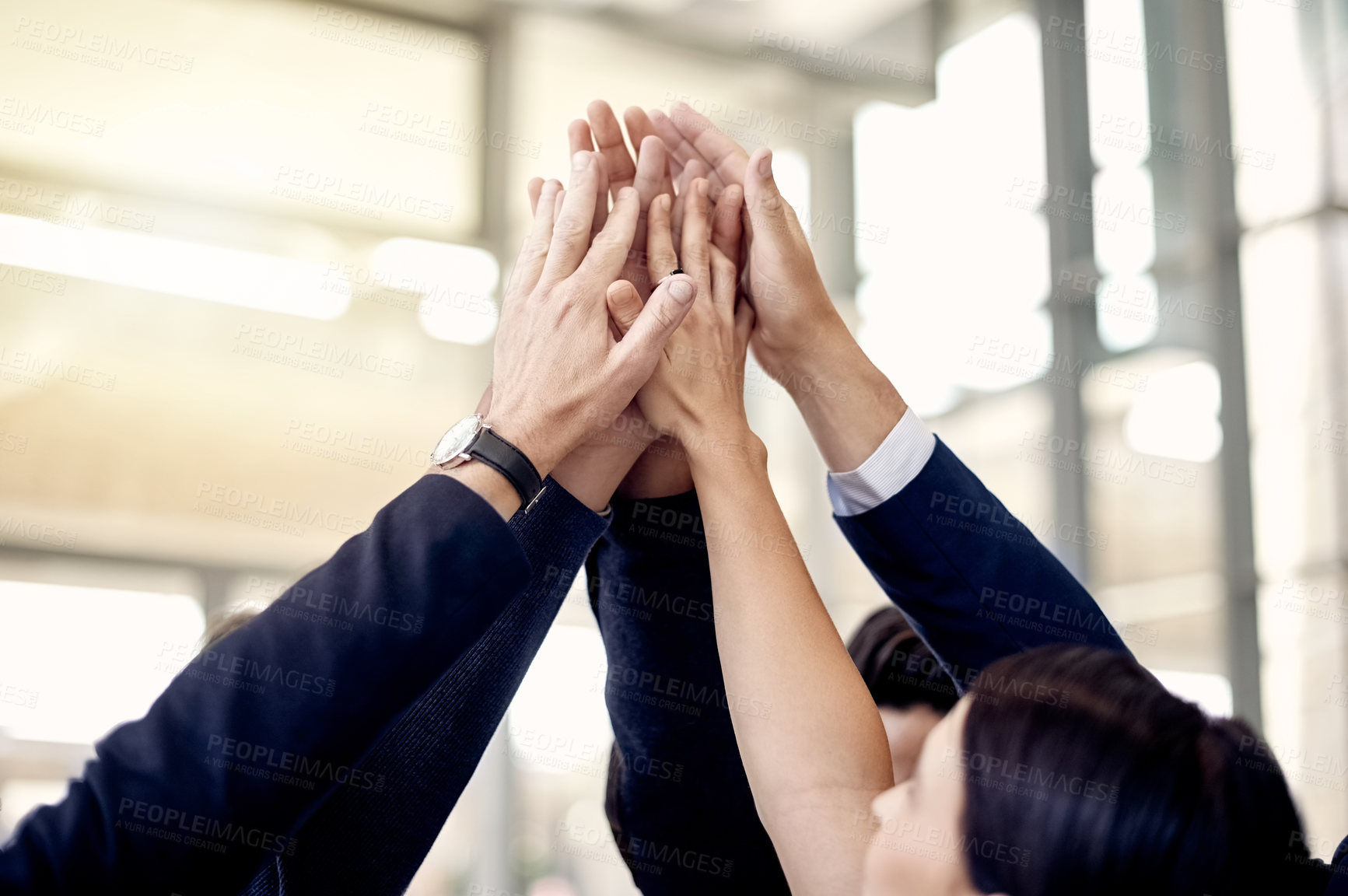 Buy stock photo Hands, lawyers and high five for teamwork, group motivation and partnership in workplace. Collaboration, case victory or people in law firm for company growth, attorney support or success celebration