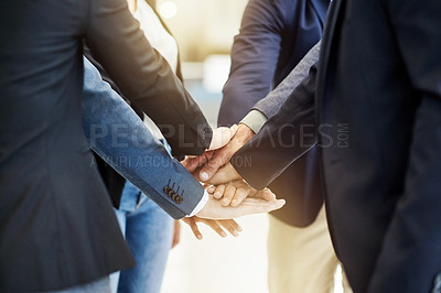 Buy stock photo Business people, team building and stack hands in office for support, synergy and cooperation. Group, workers and pile together for collaboration at work, motivation and community with mission