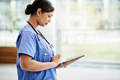 Buy stock photo Nurse, tablet and review in hospital for medical schedule, information or healthcare history. Tech, woman and worker in clinic lobby to reading email, update report and research on internet at space