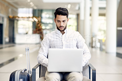 Buy stock photo Laptop, break and business man in airport lobby for conference, travel and email confirmation. Online booking, seminar schedule and flight with person, luggage and tech for reservation information
