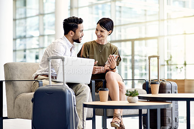 Buy stock photo Laptop, phone and meeting with business people in airport lounge for planning, conference trip and research. Luggage, travel and networking event with employees in lobby for teamwork and discussion