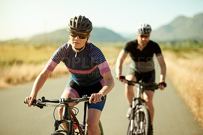 Buy stock photo Cycling, couple and woman with bicycle, road or activity for fitness, wellness or helmet for safety. Outdoor, athlete and people with eco friendly transport, healthy and race with partner and ride
