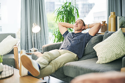 Buy stock photo Stretching, relax and man on couch with thinking, rest and break on weekend for peace in living room. Person, calm and comfortable on sofa with lounge, chilling and morning reflection in apartment