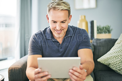 Buy stock photo Tablet, streaming and happy with man on sofa for website, connection and watching movie. Film subscription, entertainment and series browsing with person in living room of home for break and app