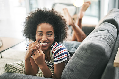 Buy stock photo Black woman, smile and portrait on couch in house with off day, weekend or rest in living room. Happy, female person and relax on sofa for break in lounge, stress relief or comfortable in apartment