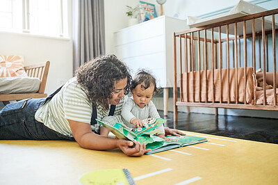 Buy stock photo Mother, baby and reading book for learning in home, storytelling and education in house. Development, care and mama read fantasy with child, kid and newborn while bonding and having fun together.