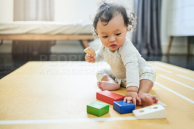 Buy stock photo Baby, boy and toy blocks on floor in nursery, childhood growth and childcare development. Kids, educational games and fun for montessori learning, cognitive puzzle and coordination of motor skills 