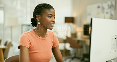 Buy stock photo Computer, smile and young black woman in the office doing research for creative project. Technology, career and professional African female designer working on desktop in the modern workplace.