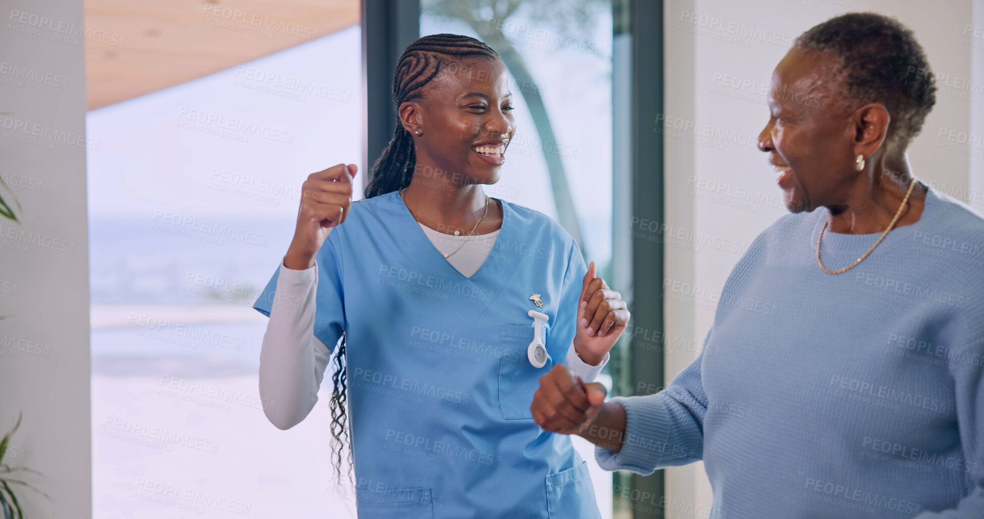 Buy stock photo Dancing, caregiver and senior patient at nursing home with happiness, feel good and wellness. Smile, movement or rhythm with black woman and nurse, homecare and mood boost for mental wellbeing