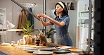 Pottery, woman and picture in shop with phone, online and social media marketing for small business. Person, clay product and photography in store with tech, content creation and post for art seller.