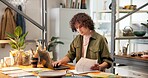 Pottery, man and laptop in small business with paperwork, stock checklist and update online catalog. Creative entrepreneur, tech and sheet in studio for clay order, item pricing and inventory control