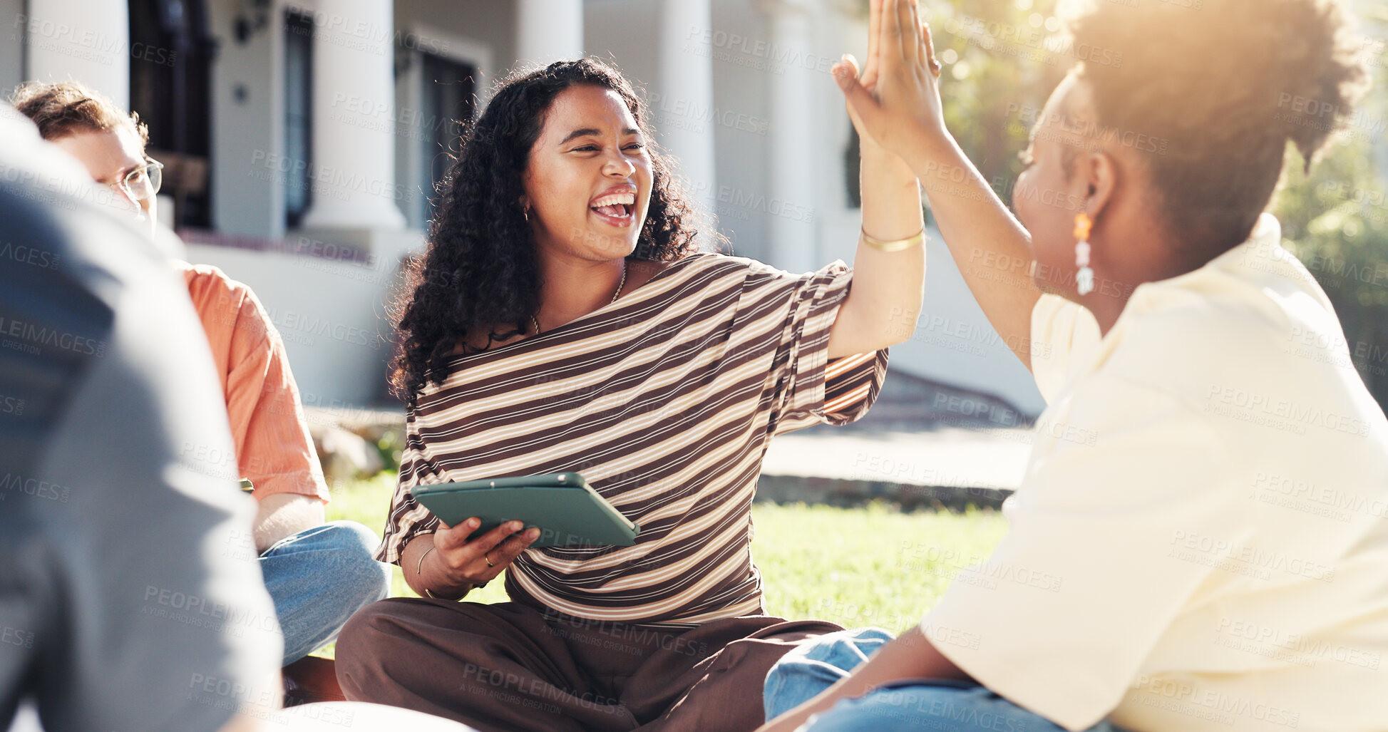 Buy stock photo Happy, students and high five in university with collaboration, help and good grade for assignment. Women, celebration and study outdoor in college with tablet, success and teamwork for education.