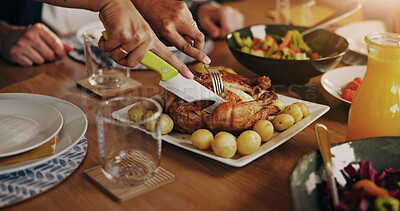 Buy stock photo Christmas, hands and roast at dinner table with cut, serving festive feast or holiday celebration. Hosting, people or carve chicken in home for xmas food, turkey or family tradition with healthy meal