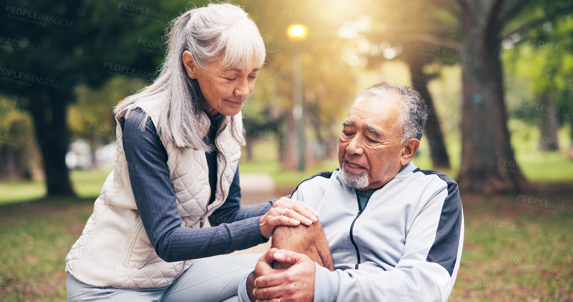 Buy stock photo Knee pain, fitness and help with old couple in park for runner risk, fibromyalgia and accident. Workout injury, training sprain and torn ligament with senior man and woman outdoor for leg check