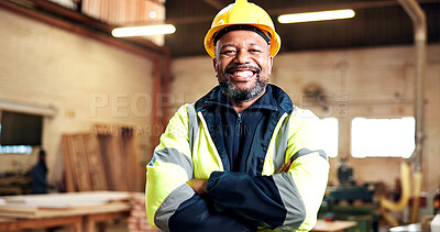 Buy stock photo Smile, black man and arms crossed in workshop for carpentry trade, joinery expert or about us. PPE, mature shopfitter and confident in portrait for custom cabinetry, manufacturing and skilled worker