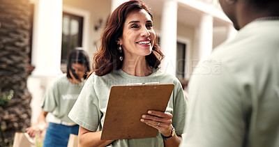 Buy stock photo Smile, woman and clipboard at event for volunteering, sign up and appoint task for charity. Happy, coordinator and people with checklist for participation, job allocation and application for outreach