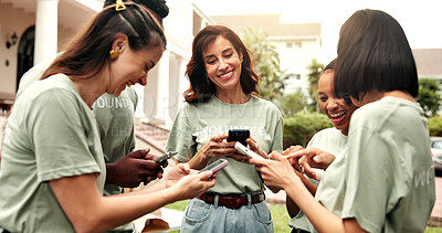 Buy stock photo Volunteer, group and happy woman outdoor with phone, team chat or online coordination for fundraiser. Mature coordinator, NGO and mobile in circle for calendar sync, event roster or donation progress