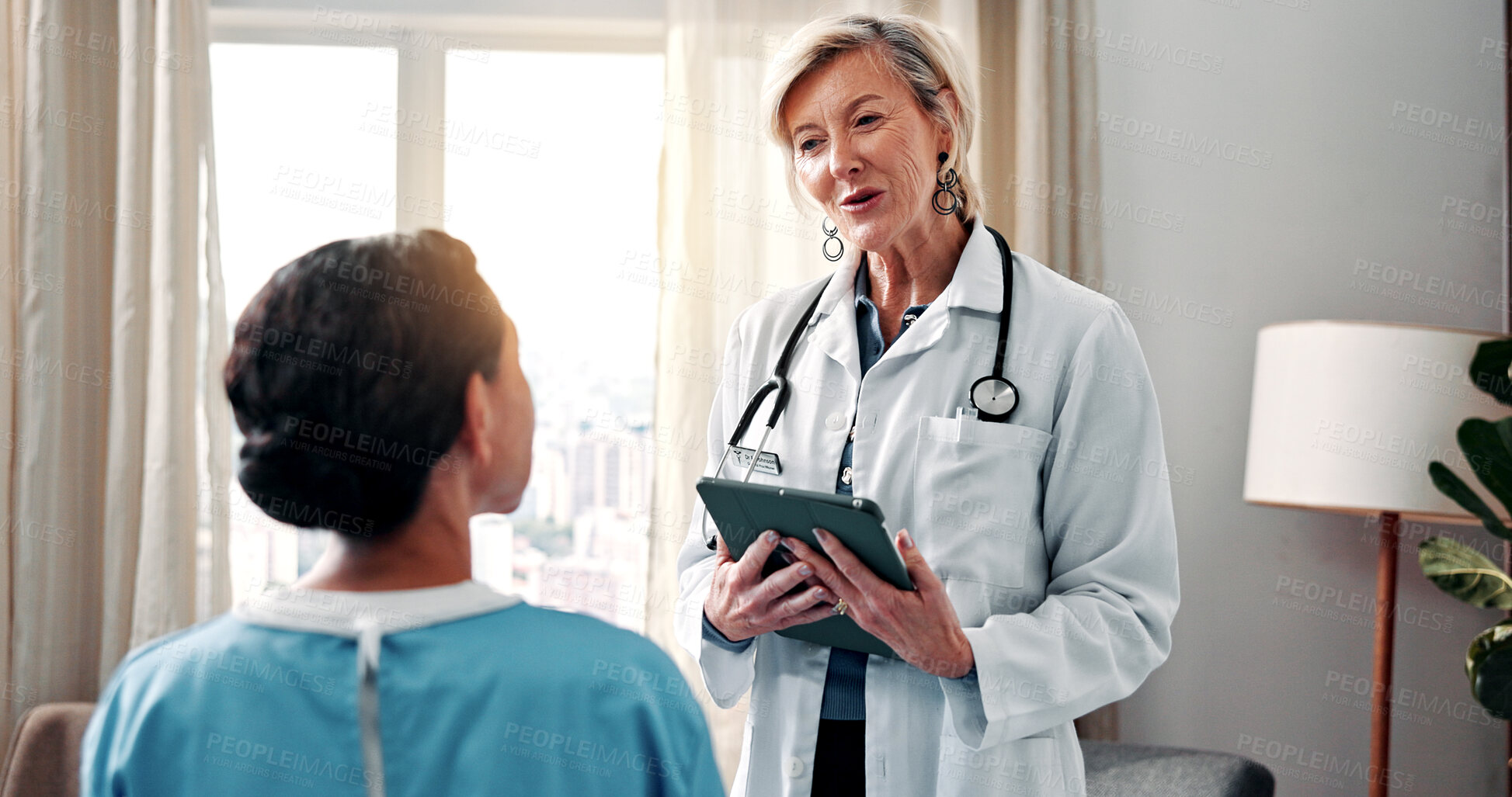 Buy stock photo Doctor, woman and talk in hospital with tablet, advice and explain test results for breast cancer. Medical worker, mature person and discussion in clinic with tech, adenocarcinoma diagnosis and help.