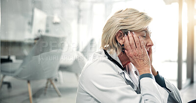 Buy stock photo Doctor, woman or tired in clinic with healthcare burnout, shift workload or sleep deprivation. Exhausted, mature professional or break in hospital for medical fatigue, overworked or clinical pressure