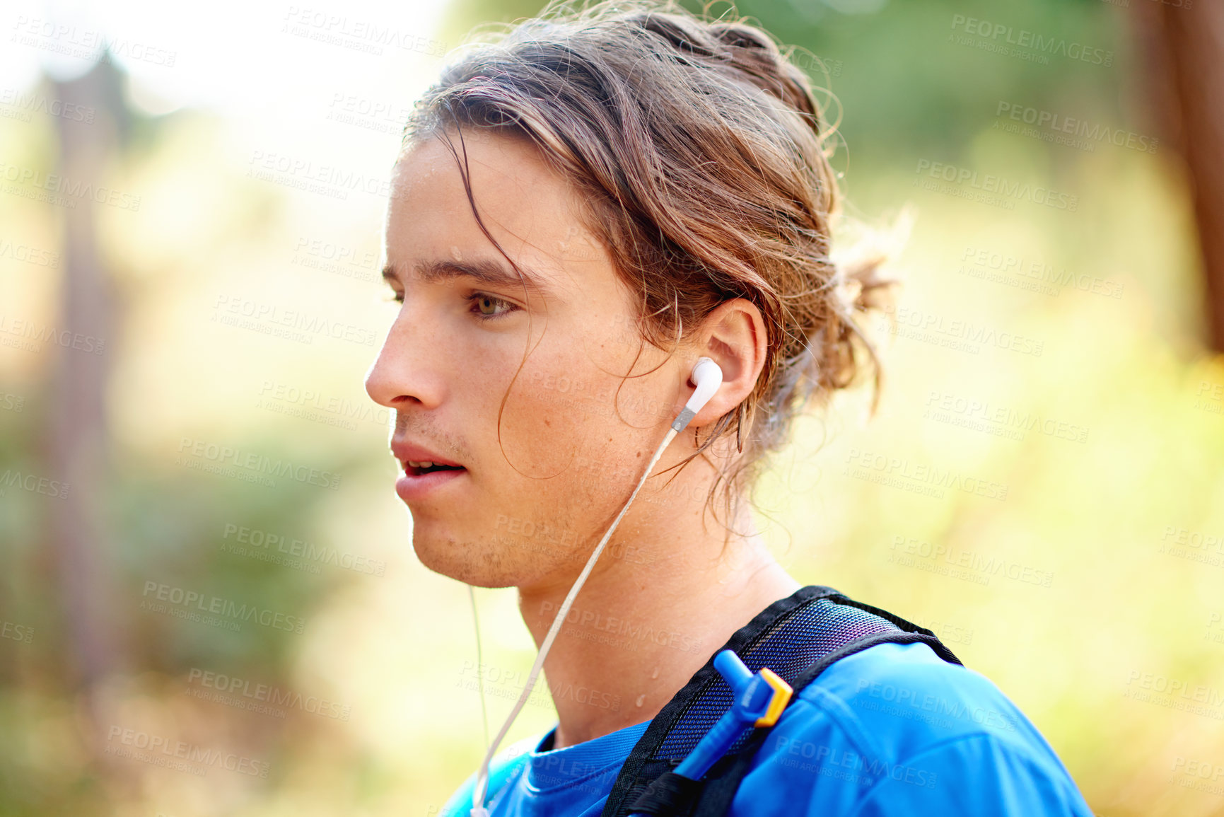 Buy stock photo Outdoor, man and fitness with music for hiking, adventure and thinking with audio track on break. Nature, male person and breathing with earphones for podcast, wellness rest and trekking with hiker