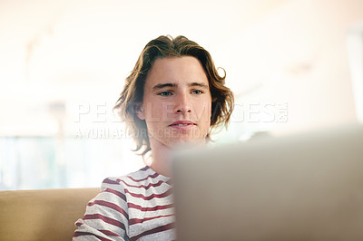 Buy stock photo Man, laptop and relax on sofa with search for movies, streaming or post on web at apartment. Person, computer and scroll on couch, film subscription or video on social network in living room at house