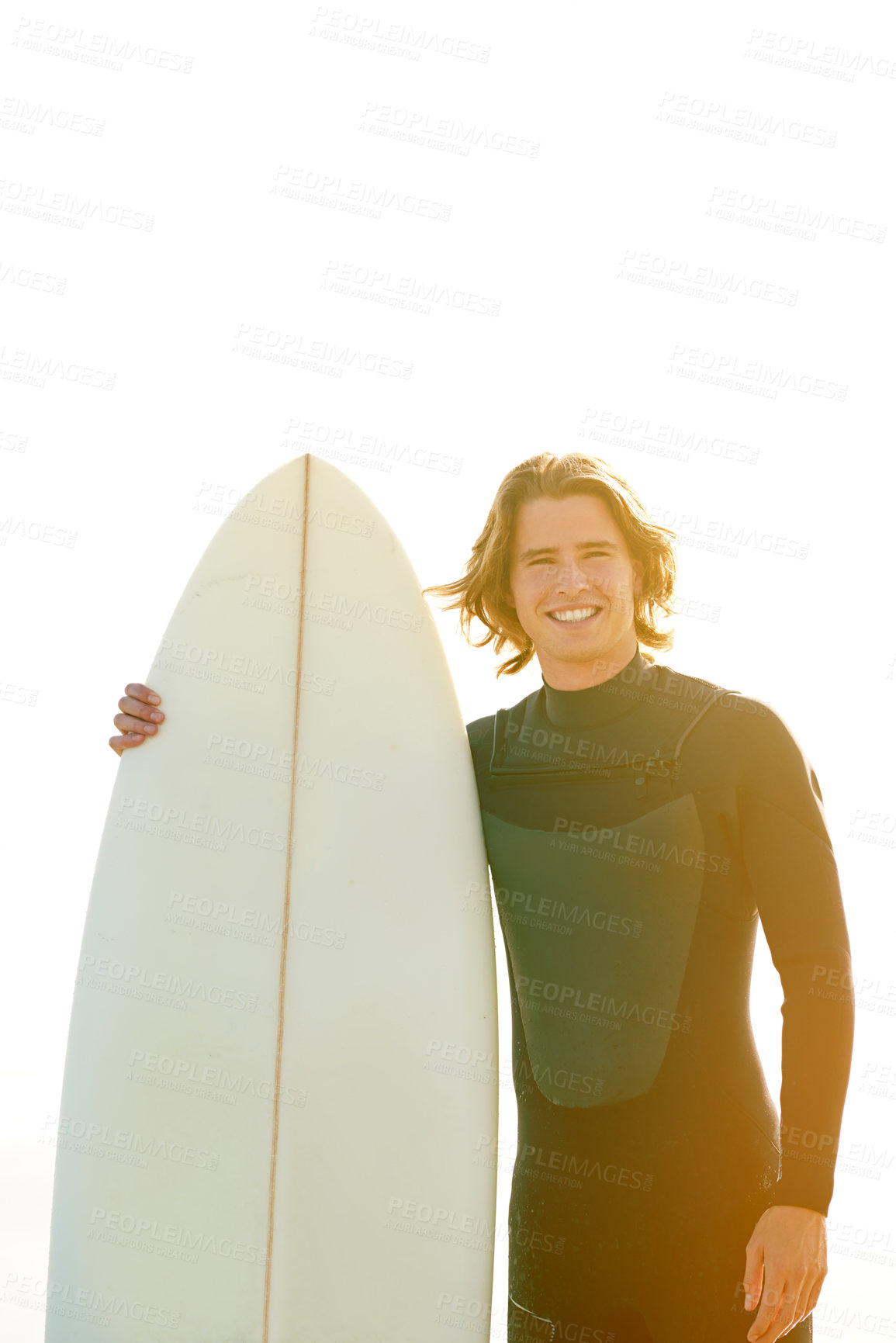 Buy stock photo Happy, surfboard and portrait of man by beach for surfing hobby, water sports and outdoor adventure. Flare, space and person by sea, ocean and sunshine for vacation, holiday and weekend in Australia