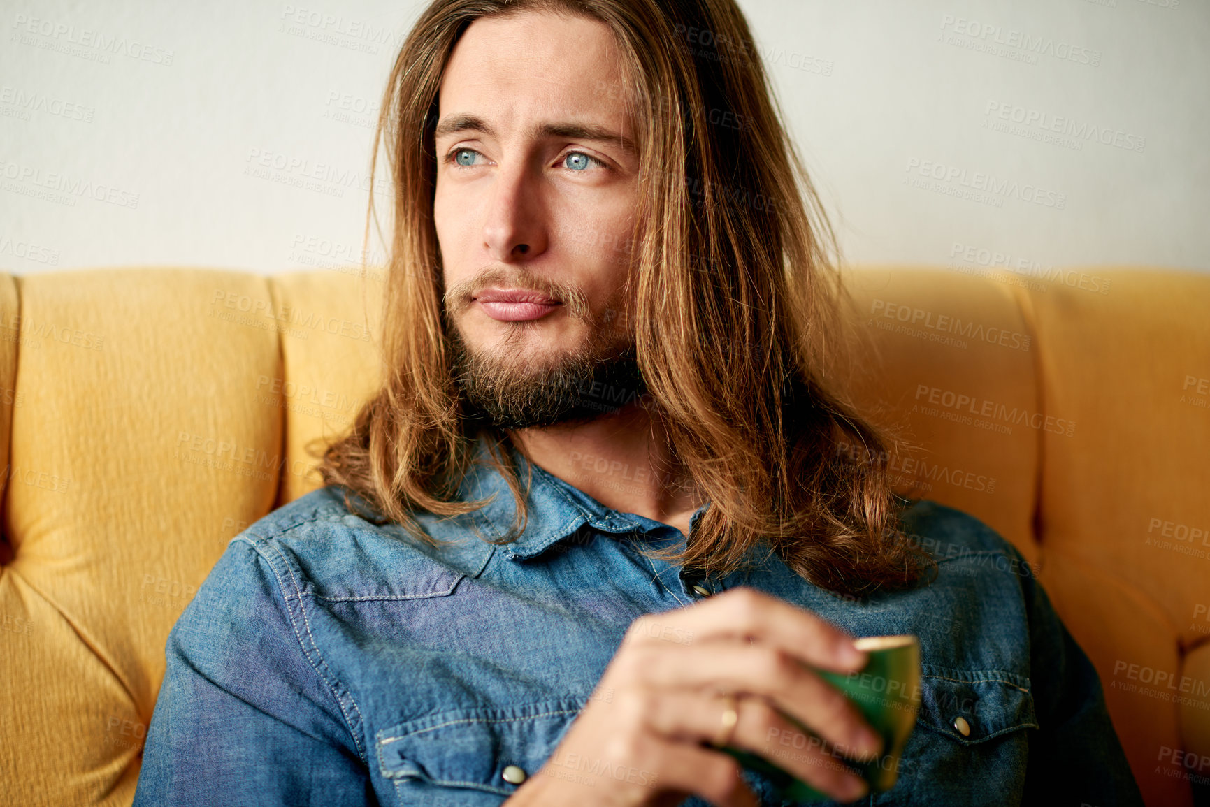 Buy stock photo Thinking, man and relax with coffee at house for morning start, planning and ideas for weekend break. Male person, contemplating and beverage with reflection, remember past and thoughtful in lounge