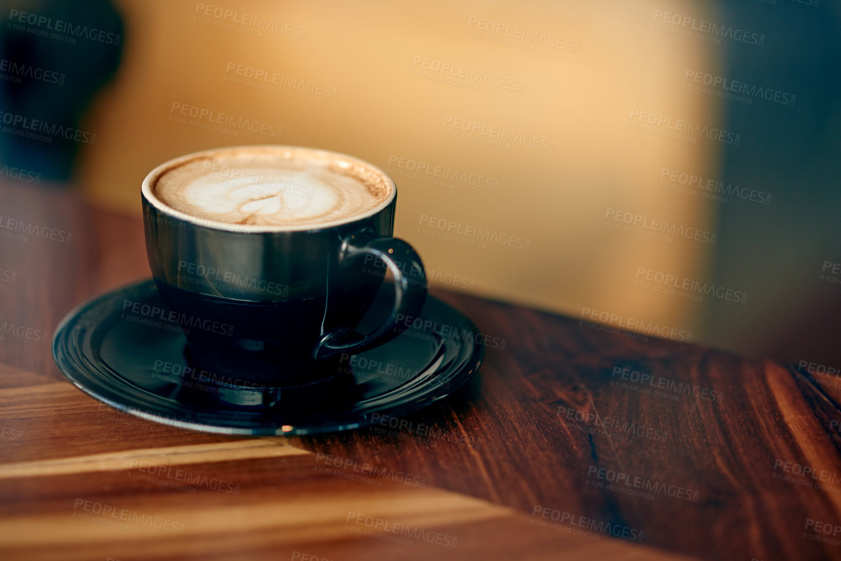 Buy stock photo Cafeteria, foam and coffee cup on table for serving caffeine beverage, warm drink and cappuccino. Hospitality, small business and mug on counter for restaurant, diner and service for aesthetic