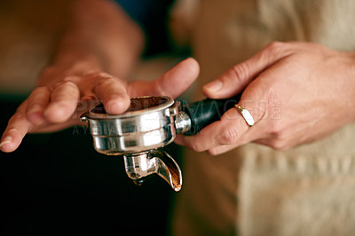Buy stock photo Cafe, hands of barista and coffee in portafilter for brewing process, premium blend order or espresso preparation. Restaurant server, person and ground caffeine for mocha beverage or customer service