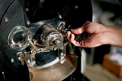 Buy stock photo Coffee, machine and hands of person in cafe for espresso, hospitality and fresh. Caffeine roast beans, quality assurance or flavor development with closeup of employee in roastery for artisan process