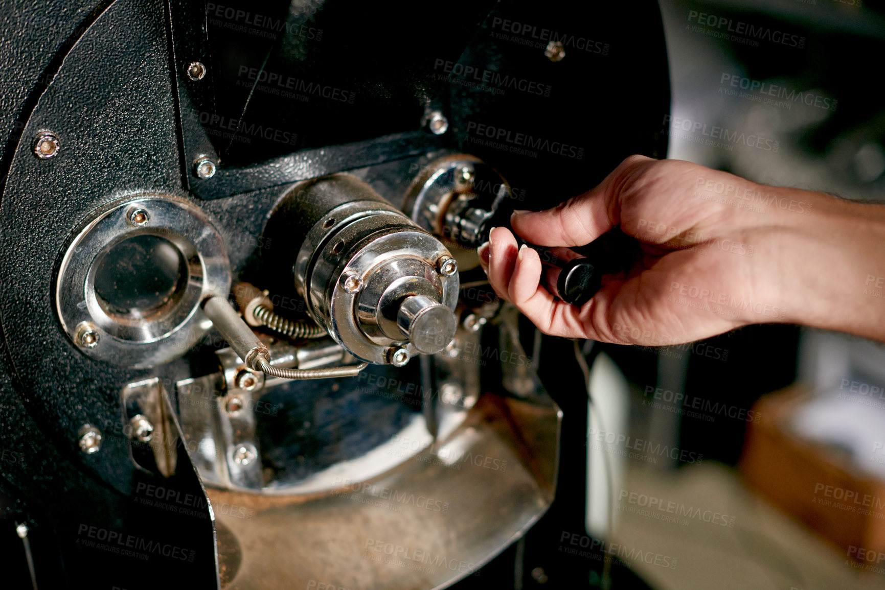 Buy stock photo Coffee, machine and hands of person in cafe for espresso, hospitality and fresh. Caffeine roast beans, quality assurance or flavor development with closeup of employee in roastery for artisan process