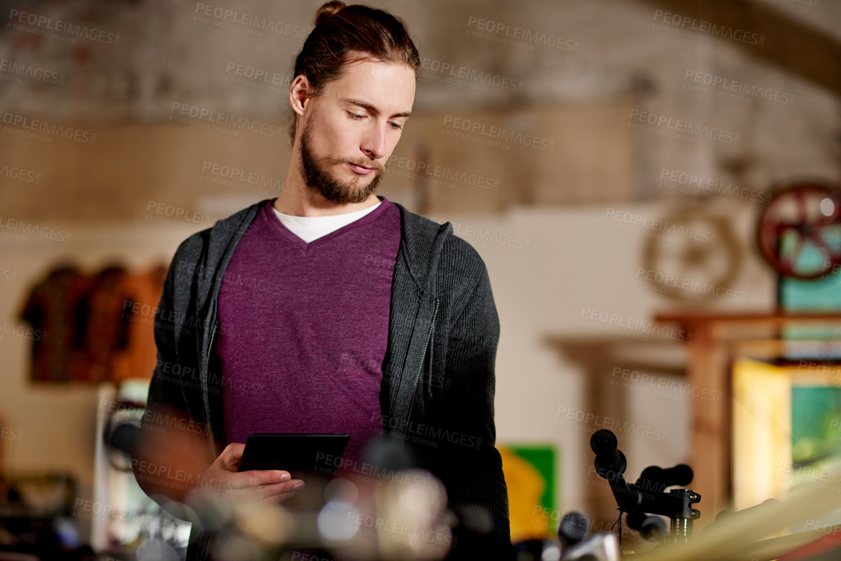 Buy stock photo Thinking, bicycle mechanic and man with tablet, small business or digital record of service in shop. Online, entrepreneur and person with tech for repair cost, reflection or idea for maintenance bike