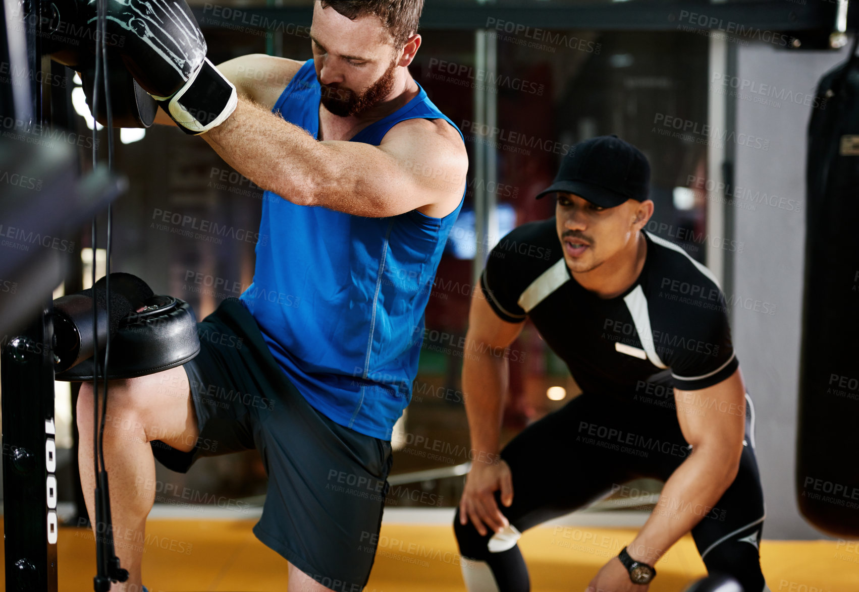 Buy stock photo Knee, pad or people with coach for fighting exercise, boxing or self defense development. Men, teamwork or athlete in sports practice for training technique or fitness workout with personal trainer