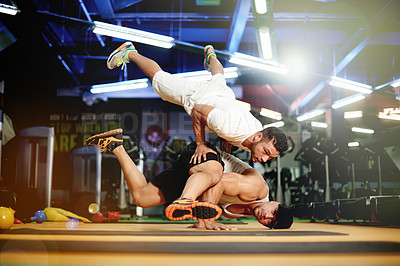 Buy stock photo Breakdance, teamwork or men in gym with balance for dancing, calisthenics training or workout. People, floor or flexible dancers in club with stability for routine, acrobatics or strength exercise