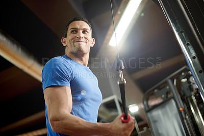 Buy stock photo Training, bodybuilder and machine with man in gym for cable pulley, fitness and muscle development. Workout equipment, athlete and strong with intense person in sports club for below of exercise reps