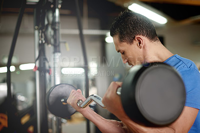 Buy stock photo Weights, sports and man in gym for workout, wellness or body building for strength challenge. Training, health and male athlete lifting barbell for arm exercise for activity in fitness center.