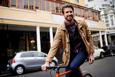 Buy stock photo Man, portrait and travel on bicycle in city for morning commute, eco friendly ride and carbon footprint. Happy, person and cycling on bike in urban road for sustainable transport or weekend adventure