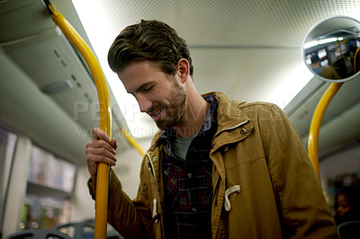 Buy stock photo Bus, travel and man with smile, commute and morning with public transportation, city service and relax. Person, traveller and passenger with safety, urban journey and ride destination with trip