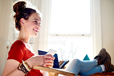 Buy stock photo Happy, home and girl with phone for social media, internet and connection for text message. Smile, relax and teenager with cellphone for communication, online chatting and contact on mobile app